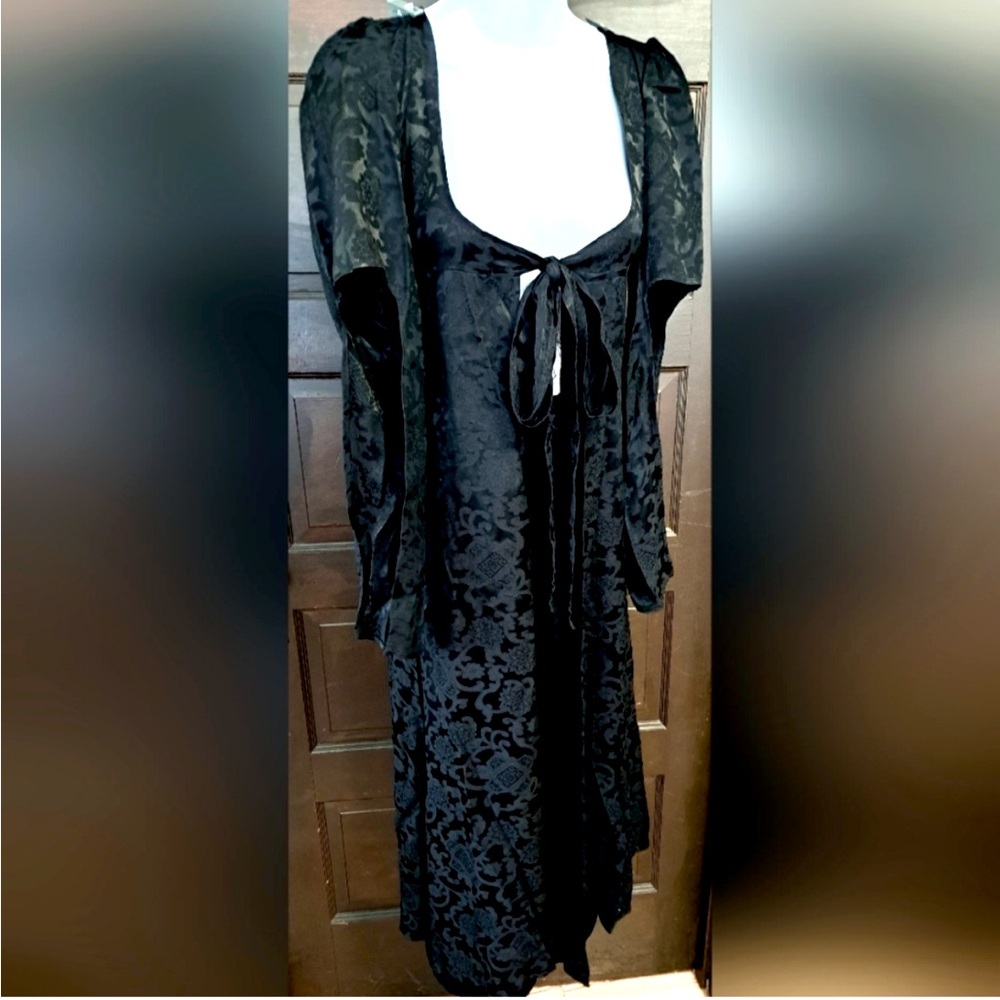 Nomadia, Small. Black tie front jacket & bloomer set.